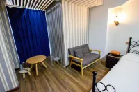 Gangzi Homestay (Baolong City Plaza)