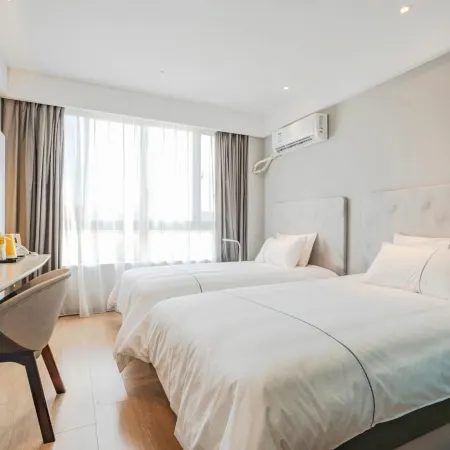 Nianbai Yulan Hotel (Feidong Platinum Center Baogong Avenue)