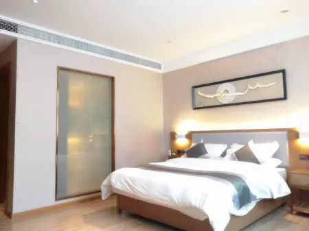 Xingzhike Hotel Отели в г. Вучуань