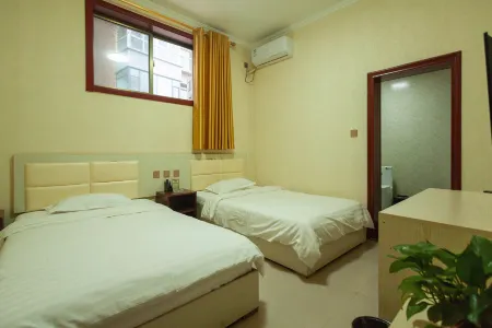 Hongtong Fengxin Express Hotel Отели рядом с достопримечательностью «Hongtong Central Square»