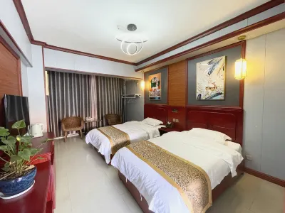 Mengla Kaicheng Hotel Hôtels à proximité de : Yiwugucha Mountain