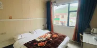 Aiweiyi Hotel - Cozy Queen Room