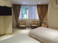 Weina Business Hotel Hôtels à : Dazhu