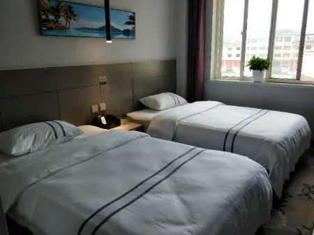 Xinyue Hotel Chain (Xiji Government Street) Отели в г. Сицзи