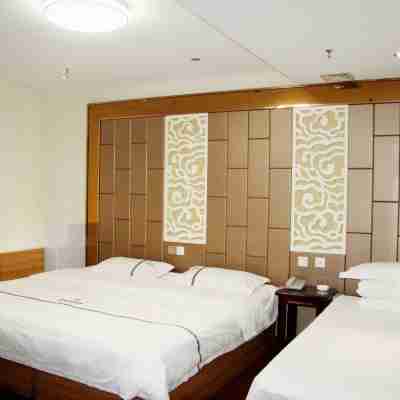 Dehui Meijia Business Hotel Rooms