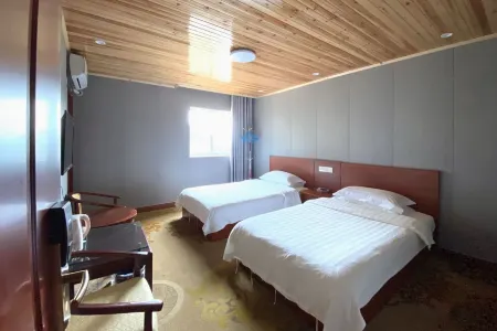 Tianlong Hotel Отели рядом с достопримечательностью «Waishuangxi Ropeway»