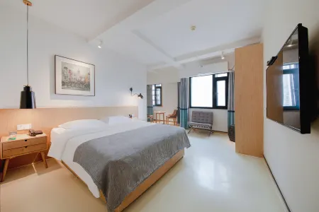 DADA Taodu Trojan Horse Hotel (Chongqing Yangjiaping Light Rail Station) Отели рядом с достопримечательностью «Chongqing Institute of Engineering (Nanquan Campus)»