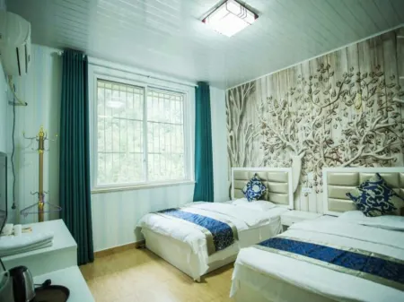 Yixue Hotel Отели рядом с достопримечательностью «Xiling Snow Mountain»