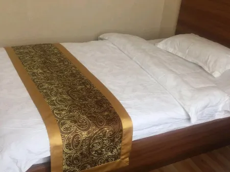 Huaguoshan Holiday Center Отели рядом с достопримечательностью «Jiulong Waterfalls»