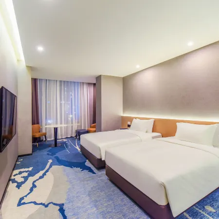 Money Holiday Inn(JiaHe wanggang Subway station store) Отели рядом с достопримечательностью «Байюнь»