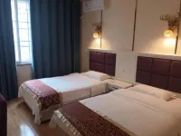 Pengzhou Xinyi Hotel