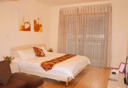 Yuzhong Aishu Hotel Отели рядом с достопримечательностью «Center Square»