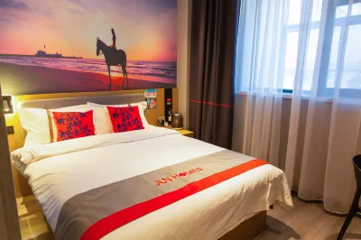 Junyi Chain Hotel (Luliang Zhongyang People's Hospital) Hotels near Square Botanical Garden