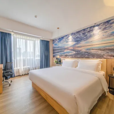Baimei Hotel (Maoming High-speed Railway Station North Square) Hotel in zona Maoming East Railway Station