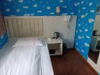 Orange Homestay (Zhengzhou Erqi Square) - Inns
