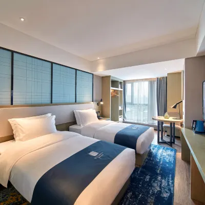 Huanlv Hotel (Chongqing North Station North Square Branch) Hotels near Chongqingbei Railway Station