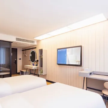 HanTing Hotel (Minquan Railway Station Bingxiong Avenue)