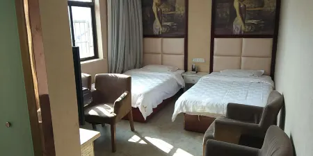 Yueyang Zijin Fashion Hotel Отели рядом с достопримечательностью «Zhang Guying Village»