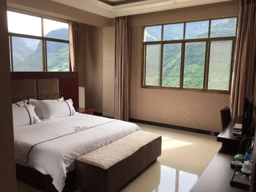 Daguan Xinhao Business Hotel - Parkplatz