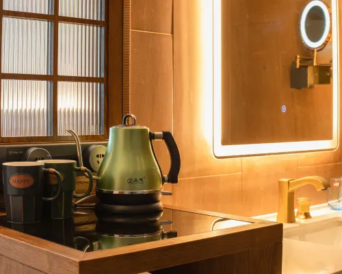 ZK Hotel (yizhuangjingjikaifaquMaqiqiao Branch) Zimmer Photos