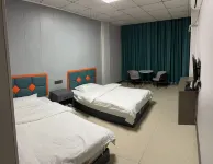 Xinyu Business Hotel (Linyi Jinqueshan Road Branch)