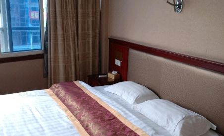 Pingjiang Jiutian Hotel - Housity