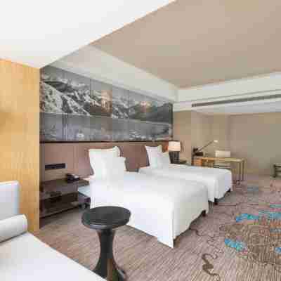 Universal Hotel Urumqi Rooms