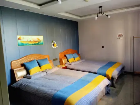 Guannan Kanglefu Hotel Отели рядом с достопримечательностью «Er'langshen Culture Relics Park»