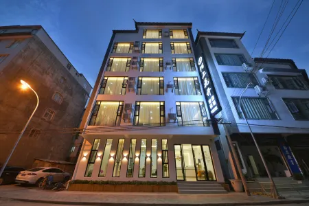 Jianchuan Moshang Huakai Light Homestay Отели рядом с достопримечательностью «Jianchuan Old Town»