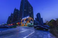 Yixiyun Hotel (Qihe Wanda Branch) - Bãi đậu xe