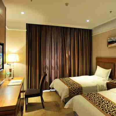 藝龍萬國飯店(遼源火車站中醫院店) Rooms