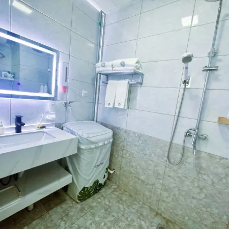 Ouli Smart Homestay (Daqing Wanda Plaza)