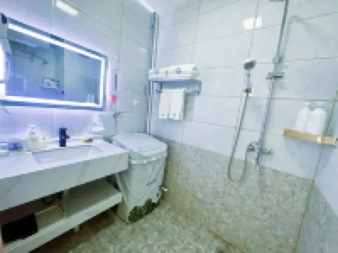 Ouli Smart Homestay (Daqing Wanda Plaza)