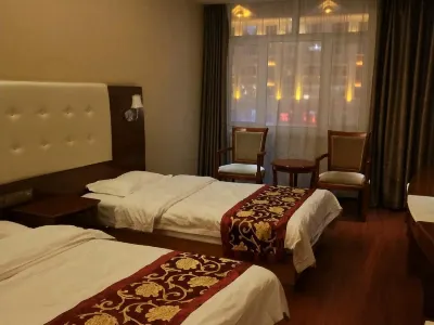 Xinhe Business Hotel Отели рядом с достопримечательностью «Wuerqihan Forest Park»