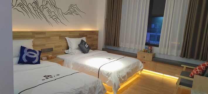 Fengqing Gunai Homestay Hotele w: Powiat Fengqing