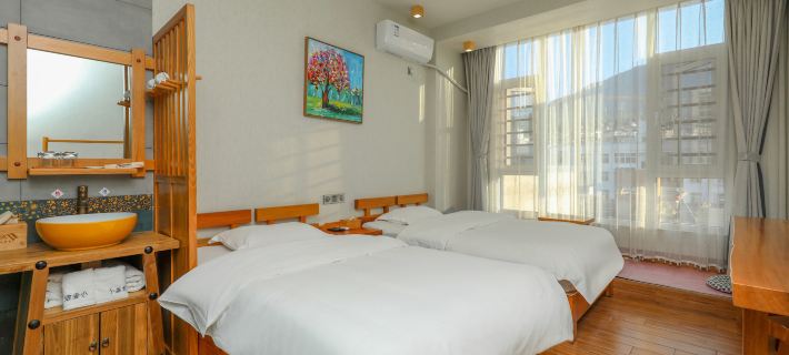 Xinping Xiaoguaijia Inn Hotels in Xinping