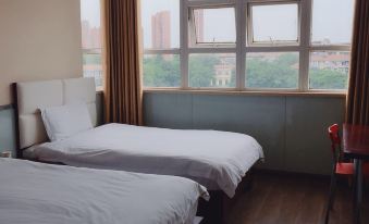 Jianxin Hotel (Wuhan Caidian Shopping Plaza Branch)