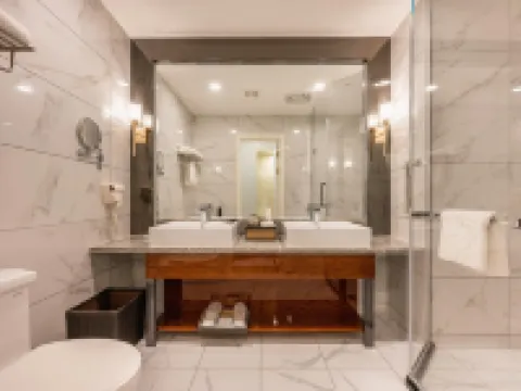 聖湖インターナショナルホテル クムル（クムル駅天馬商場） クムル市のホテル