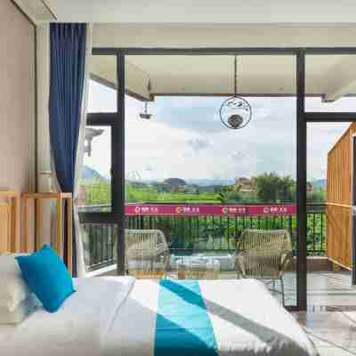 普者黑古井園酒店 Rooms