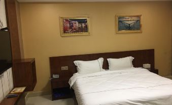 Wuchuan Xuanyi Business Hotel