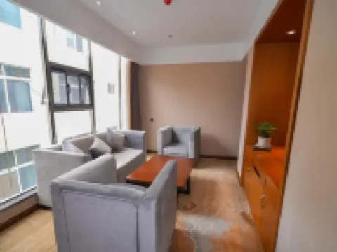 Huize Pusu Hotel Hoteles en Huize