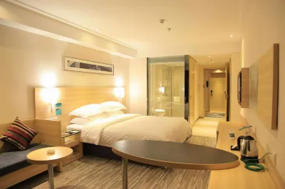 wating hotel Отели в г. Цичунь