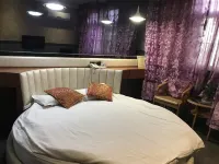 Hexianxiangqing Business Hotel