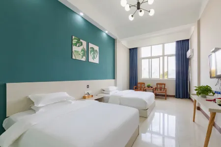 Shuai Guest Fashion Hotel (Huanggang Donghua Passenger Terminal) Отели рядом с достопримечательностью «Yi'ai Lake»