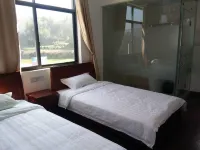 Jixi Baobao Inn - Losmen
