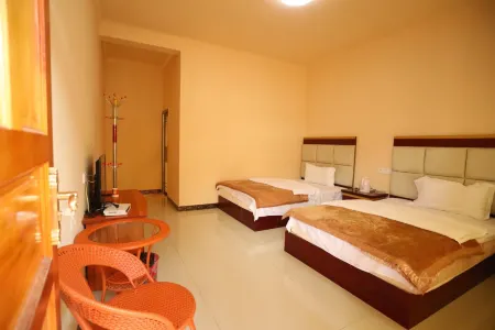 Yanyuan Juxingyuan Inn Отели рядом с достопримечательностью «Sichuanlugu Lake Scenic Area»