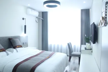 City 118 Select Hotel (Dongming Nanhua Shopping Plaza) Отели в г. Дунмин