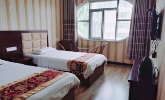 Mizhi Xiaocheng Business Hotel