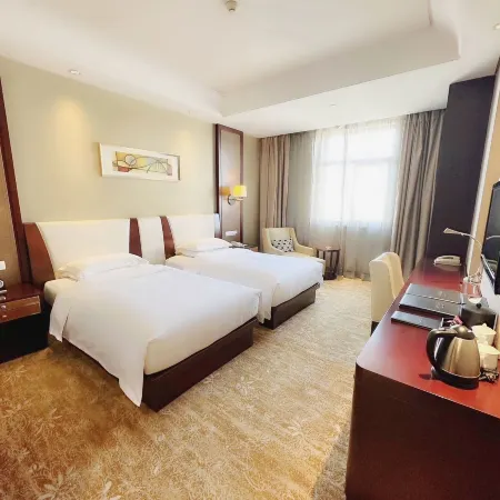 Zhongwei International Holiday Hotel Отели в г. Фушунь