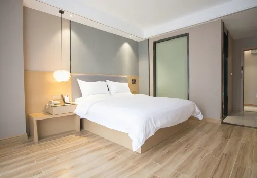 Chuxing Xinxuan Hotel (Lichuan Central Passenger Transport Dongfangcheng)